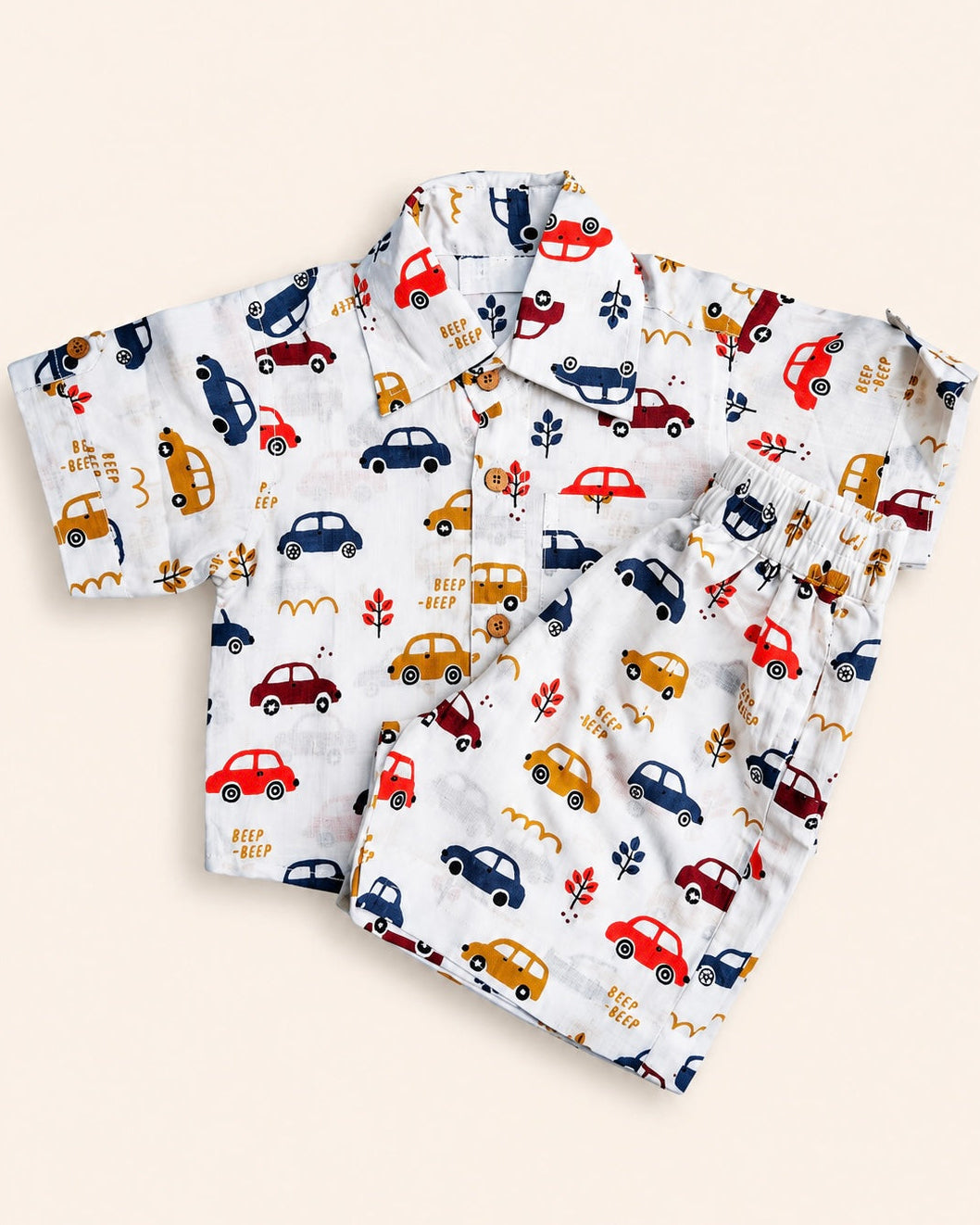 Set of children's pajama shorts with car pattern on a beige background from Aruvo