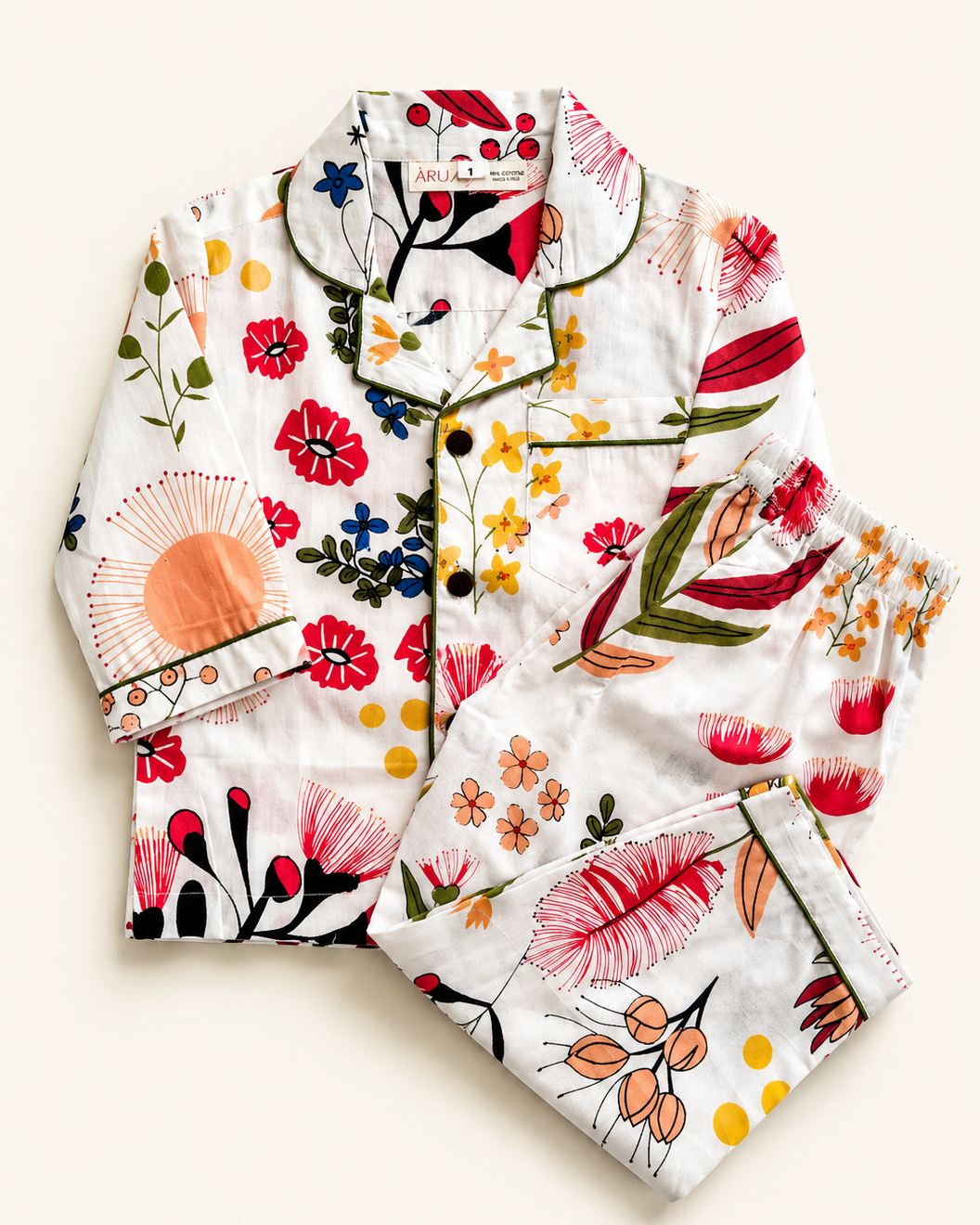 Aruvo premium Cotton kids night suit set in white color with floral printing on it